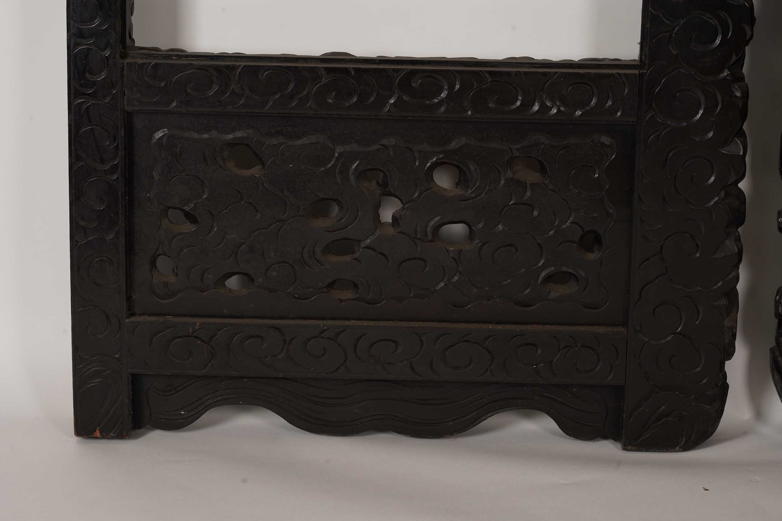 A pair of large Japanese carved hardwood ’dragon’ screen frames, Meiji period